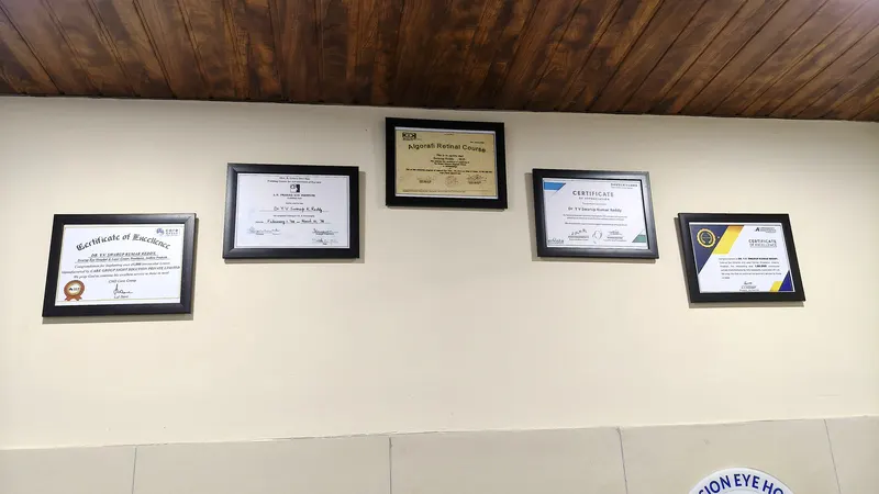 Framed awards and recognitions displayed on the hospital wall