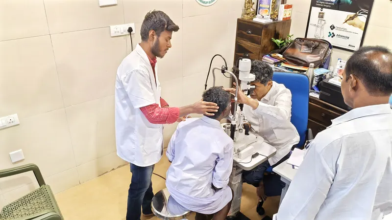 Doctor consulting a patient at the examination table