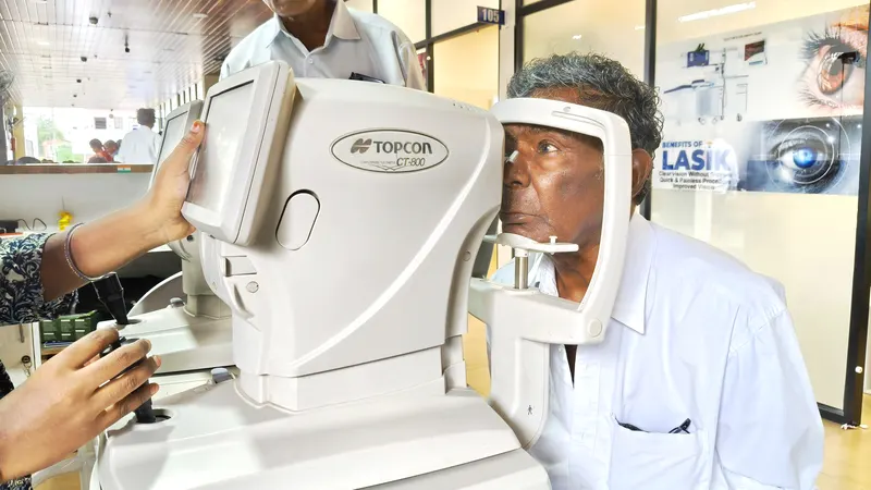 Patient being examined at the slit lamp by the doctor